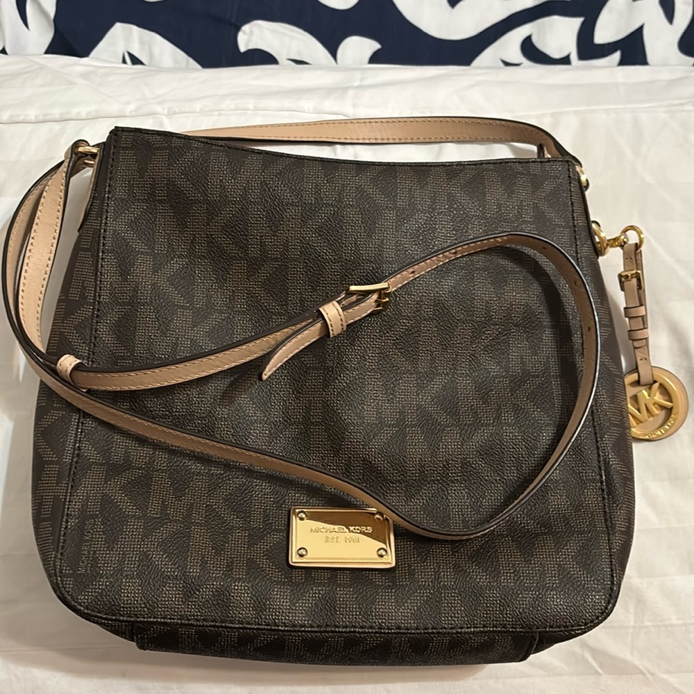 Michael Kors leather crossbody
Small ink stain inside